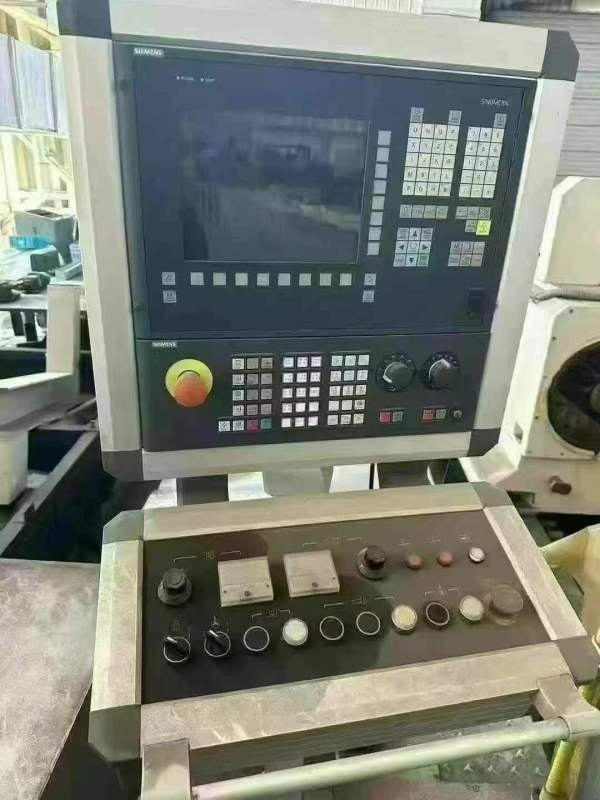 刚刚买下上海机床产砂轮架移动式数控外圆磨床MKA13100.