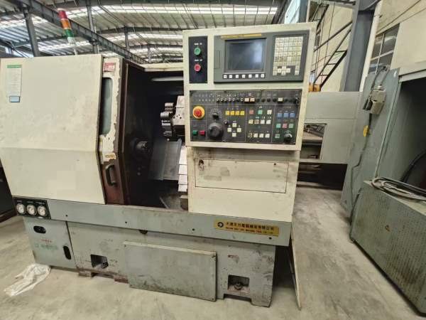 两台大连斜车，发那科系统，回转直径500，长度300，带.