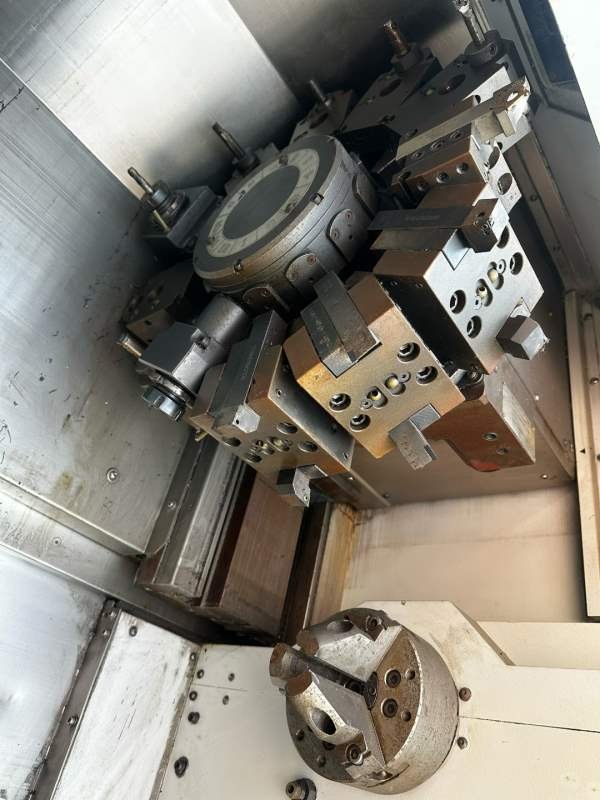 双主轴程泰车铣复合带送料机