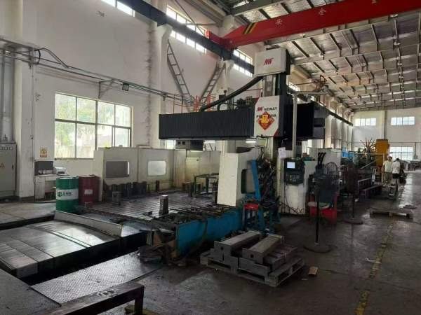 纽威6米数控龙门参数：工作台2.5米6米，门宽3.8米，门.