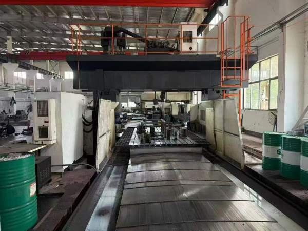 纽威6米数控龙门参数：工作台2.5米6米，门宽3.8米，门.