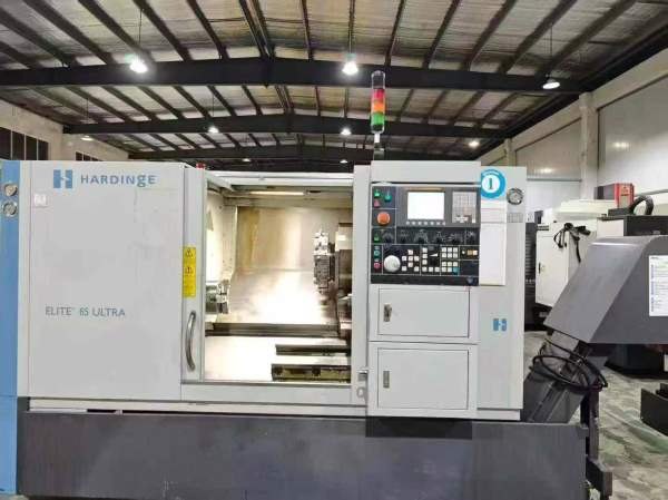 刚刚买下美国哈挺65U高精密数控车床一台、加工直径411.