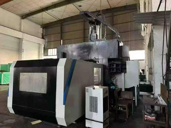 刚买一台国盛3216龙门加工中心一台，工作台3.2米1.4米.