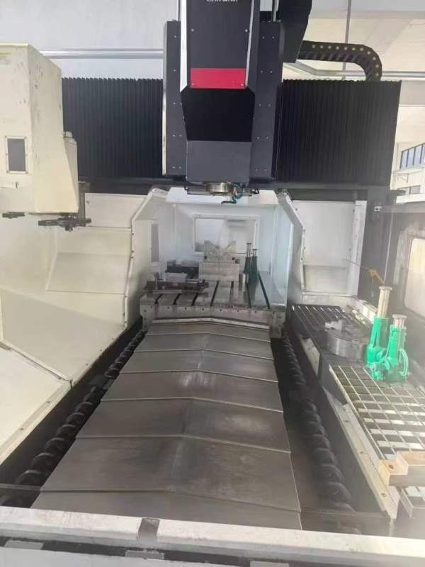 台群1220门龙加工中心三滚轴柱线轨发那科0i-FMplus系.