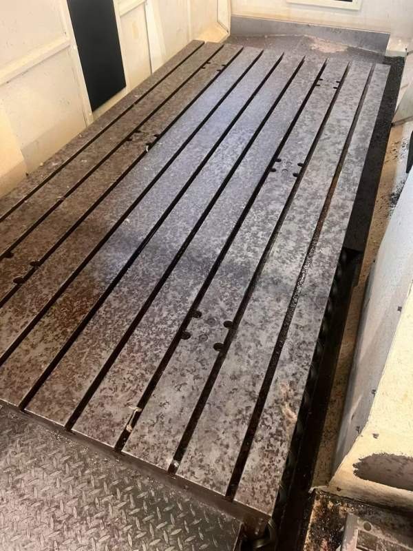 纽威PM1530HA。工作台1.5X3米，门宽1.8米，门高1.2米.