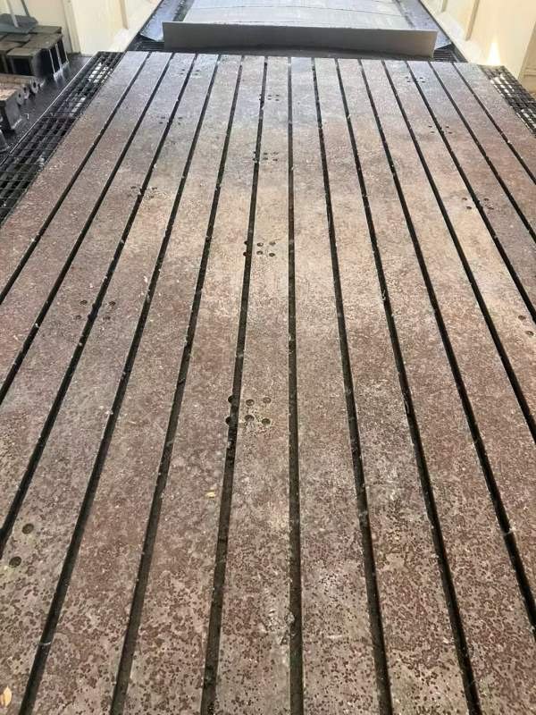 纽威PM3060HZ。工作台3X6米，门宽3.8米，门高1.6米。.