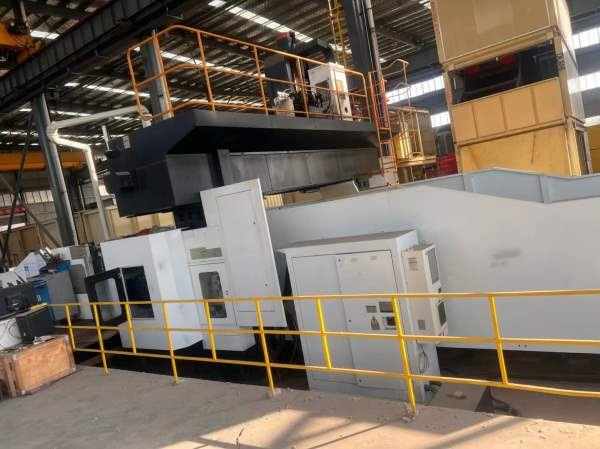 纽威PM3060HZ。工作台3X6米，门宽3.8米，门高1.6米。.