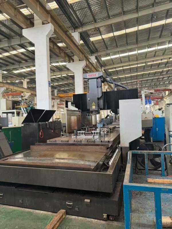 10年威立521龙门，工作台2米5米，门宽2.3米，门高1.1.