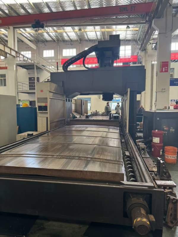 10年威立521龙门，工作台2米5米，门宽2.3米，门高1.1.