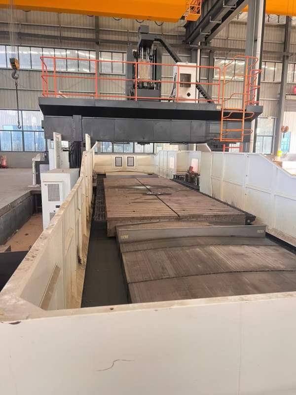 河南工厂纽威PM3080HZ。工作台3X8米，门宽3.8米，门高.