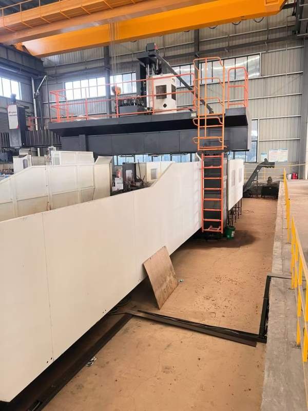 河南工厂纽威PM3080HZ。工作台3X8米，门宽3.8米，门高.