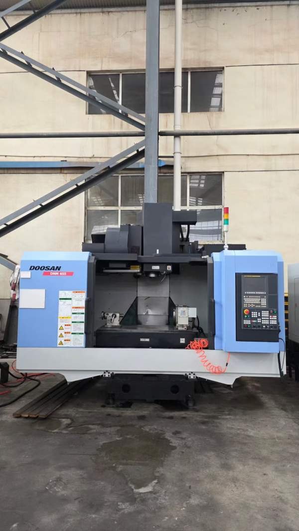 韩国斗山DNM655加工中心，三轴线轨，配BT40主轴，24把.