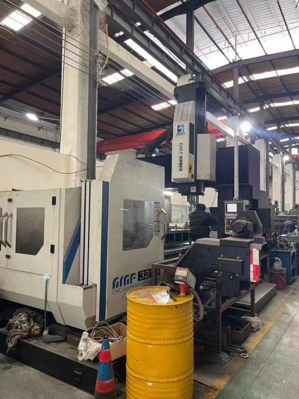 国盛3216龙门加工中心，工作台1.4米3米，门宽1.6米，.