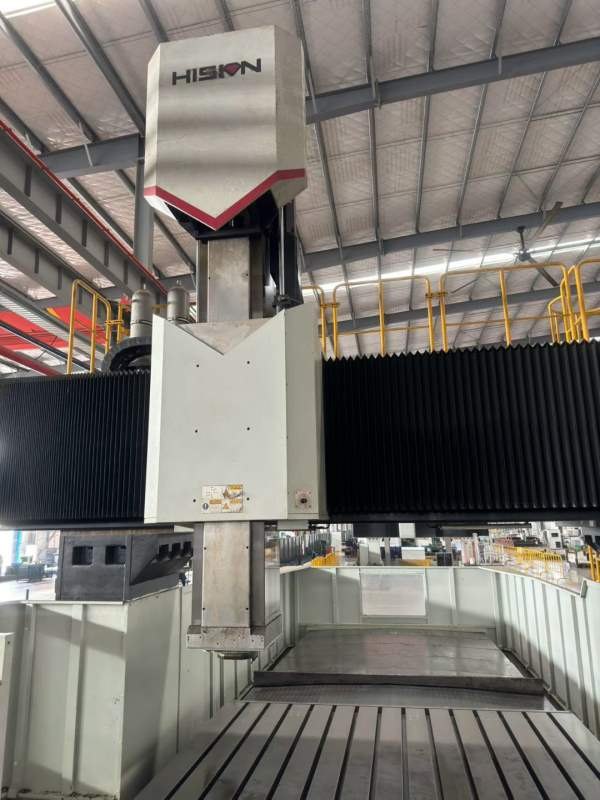 海天5米龙门，工作台3米5米，门宽3.65米，门高1.57米.