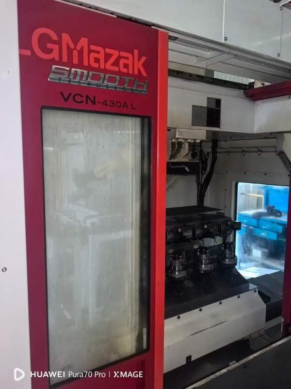 一台准信马扎克430A   带中心出水  液压夹具  喜欢的.