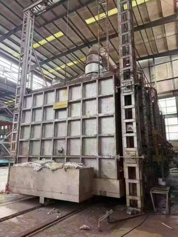 12米100吨天然气台车热处理炉，标牌上有具体的参数