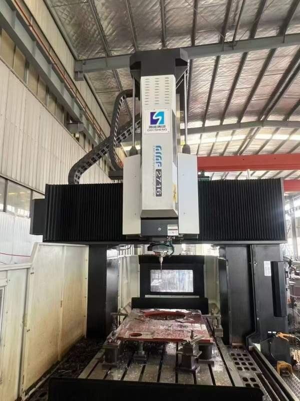 南通国胜2716数控龙门，工作台1400/2700mm，门宽1700m.